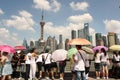 Shanghai skyline with tourists