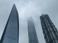 Shanghai--Skyscrapers and Shanghai Tower lost in clouds Royalty Free Stock Photo