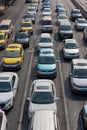 Shanghai taxis form part of a traffic queue.