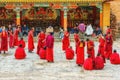 Buddhist Tibet monks relaxing in Songzanlin Temple also known as the Ganden Sumtseling Monastery. Shangri la, Yunnan province ,