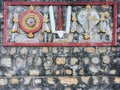 Shanka, Chakra and Tilak Mural on Temple Wall.