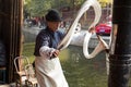 SHAOXING , CHINA: Chinese man making and selling traditional handmade dragon`s beard candy at old town of Anch