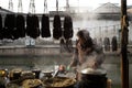 SHAOXING , CHINA: Chinese woman selling traditional local noodle at old town of Anchang during winter