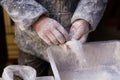 SHAOXING , CHINA: Close up of a chinese man making traditional handmade dragon`s beard candy at old town of An