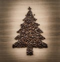 Shape of christmas tree made of coffee beans on a red background