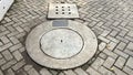 The shape of the concrete drain cover with holes on the heringbone motif conblock floor