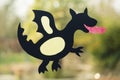 Shape of a dragon made with paper as handicraft activity for chi