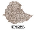 Shape of Ethiopia map made of scattered coffee beans, country name below