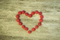 Heart Of Raspberry On Wooden Board Background. Royalty Free Stock Photo