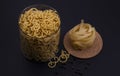 Shape pasta in different  sizes and colors from close range Royalty Free Stock Photo