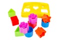 Shape sorter toy with various coloured blocks isolated Royalty Free Stock Photo