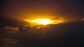 the shape of the sun and clouds looks like a burning eye in the sky Royalty Free Stock Photo