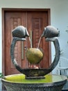 The shape of the two urn fountain is very beautiful and unique in the front garden of the house Royalty Free Stock Photo