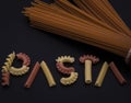 Shaped and colorful pasta in different  sizes and colors together from close range. Royalty Free Stock Photo