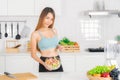 Fitness girl holding salad bowl Royalty Free Stock Photo