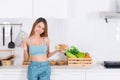 Woman is preparing healthy food at kitchen Royalty Free Stock Photo