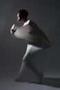 Shapely Woman in Creative Light and Spandex Fabric Royalty Free Stock Photo