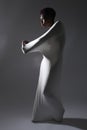 Shapely Woman in Creative Light and Spandex Fabric Royalty Free Stock Photo