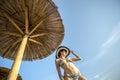 Shapely woman enjoying a tropical summer vacation