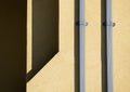 Shapes and Angles Shadows of Yellow Exterior Building Wall Royalty Free Stock Photo