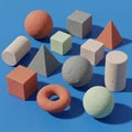 Shapes are arranged on a blue surface including a sphere cube Royalty Free Stock Photo