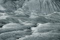 Shapes in ground formed by the mud flows at Muddy Volcanoes of Paclele Mari, near Buzau.