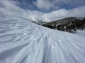 Shapes, patterns and formations formed by the effect of the storm on high mountains