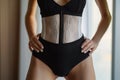 A shapewear bodysuit on woman is a type of undergarment Royalty Free Stock Photo