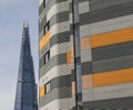 The Shard of London, blue skies and stripy building.