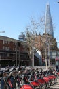 Shard, London, UK - July 7th 2022: Shard with Santander rental bikes for hire in London.