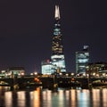 The Shard skyscraper and Thames river at sunset in London