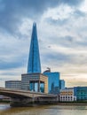 Shard Tower and the banks of Thames river below London Bridge Royalty Free Stock Photo