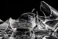 Shards of broken glasses on a black background Royalty Free Stock Photo