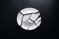 shards from a broken white plate on a black background. Royalty Free Stock Photo