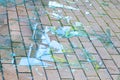 Shards of glass. Broken glass on the cobblestones. The concept of destruction