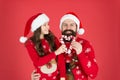 Share joy and happiness. Christmas Carol. Father and daughter with candy canes christmas decorations. Family holiday Royalty Free Stock Photo