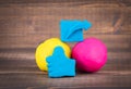 Share and like hand icon from plasticine and multiple colorful balls