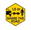 Share the road, pass cyclists safely and keep safety distance. Warning yellow hexagon sign Royalty Free Stock Photo