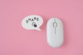 share word and click icon on real speech bubble paper cut , computer wireless mouse on pink background. User generated content, Royalty Free Stock Photo