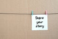 Share your story. Note is written on a white sticker that hangs Royalty Free Stock Photo