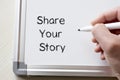 Share your story written on whiteboard Royalty Free Stock Photo