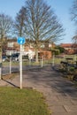 Shared circular blue and white British pedestrain and cycle path sign in urban setting