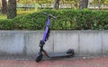 Shared electric scooters standing on the sidewalk is Seoul, Korea