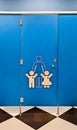 Shared family bright restroom in airport, mall. Unisex WC for mom, dad,little girl boy,child kid. Use together Royalty Free Stock Photo