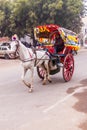 A shared horse pulled taxi in Agra, India
