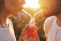 Sharing drink. Royalty Free Stock Photo