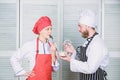 Sharing good time. secret ingredient by recipe. cook uniform. Menu planning. culinary cuisine. Family cooking in kitchen Royalty Free Stock Photo