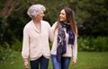 Sharing the perfect mother-daughter relationship. an attractive woman and her senior mother talking outside. Royalty Free Stock Photo