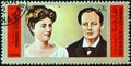 SHARJAH - CIRCA 1972: A stamp printed in United Arab Emirates shows Winston Churchill and Queen Alexandra of England