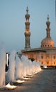 Sharjah city mosque with lights, fountain, conctruction and mode